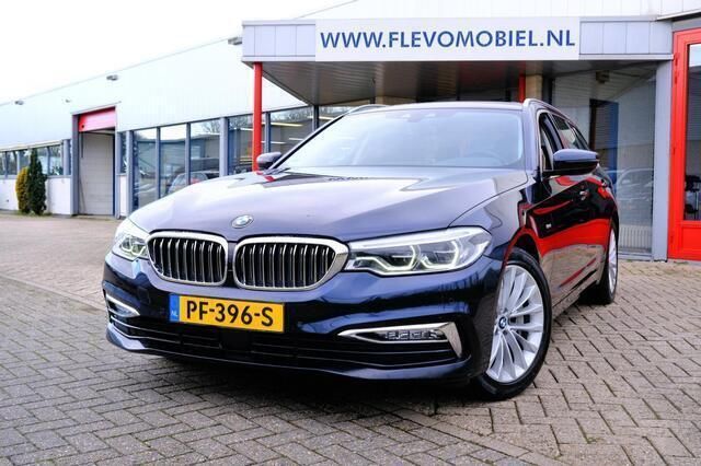 Blauw, metallic lak Gebruikt 2017 BMW 530 Executive Stationwagen | € 23.750 (Goede deal) - Afbeelding 1/4