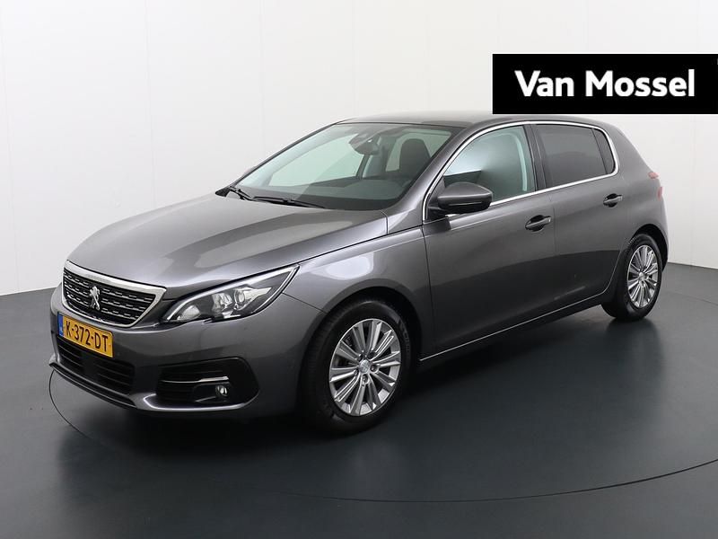 Grijs Gebruikt 2020 Peugeot 308 Premium Hatchback | € 12.240 (Eerlijke prijs) - Afbeelding 1/4