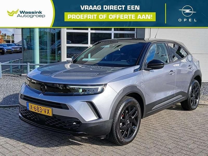Grijs Gebruikt 2024 Opel Mokka SUV | € 24.940 (Eerlijke prijs) - Afbeelding 1/4