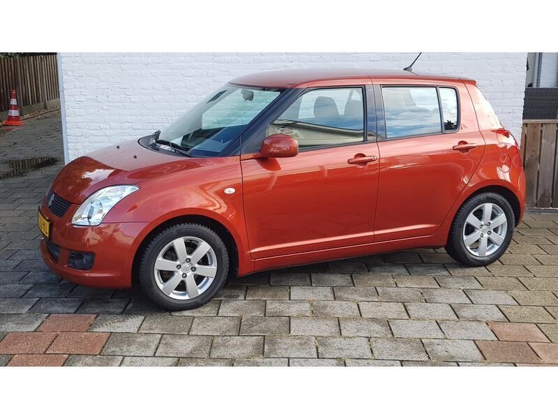 Oranje Gebruikt 2010 Suzuki Swift Hatchback | € 6.799 (Duur) - Afbeelding 1/4