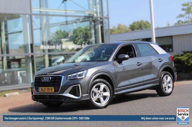 Grijs Gebruikt 2024 Audi Q2 Design SUV | € 33.950 (Eerlijke prijs) - Afbeelding 1/4