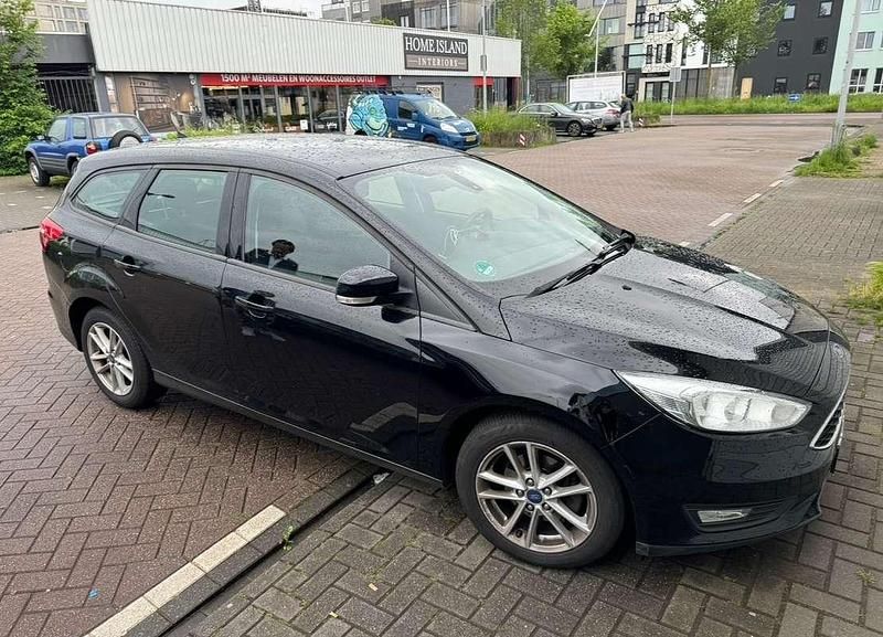 Zwart Gebruikt 2016 Ford Focus Titanium Stationwagen | € 6.249 (Goede deal) - Afbeelding 1/4