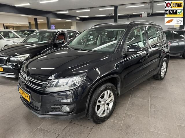 Zwart (metallic) Gebruikt 2012 VW Tiguan Comfortline SUV | € 5.950 (Goede deal) - Afbeelding 1/4