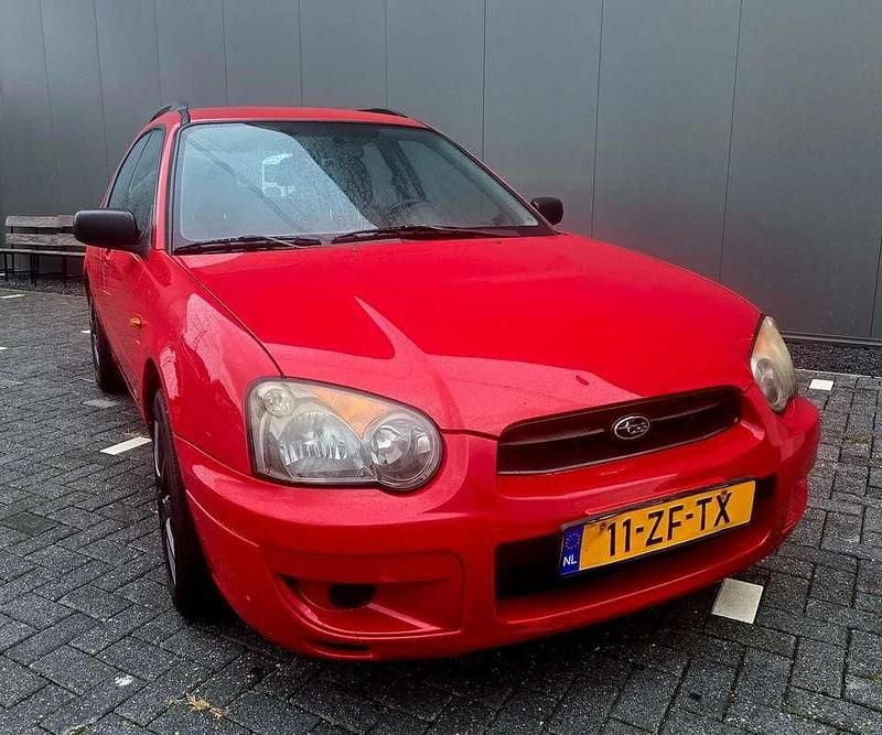 Rood Gebruikt 2004 Subaru Impreza Stationwagen | € 4.450 - Afbeelding 1/4