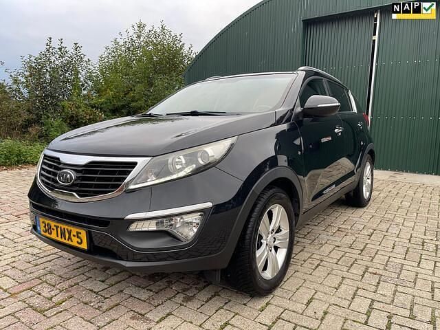 Zwart Gebruikt 2012 Kia Sportage Plus SUV | € 7.995 (Eerlijke prijs) - Afbeelding 1/4
