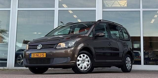 Bruin, metallic lak Gebruikt 2010 VW Touran Trendline MPV | € 4.444 (Goede deal) - Afbeelding 1/3
