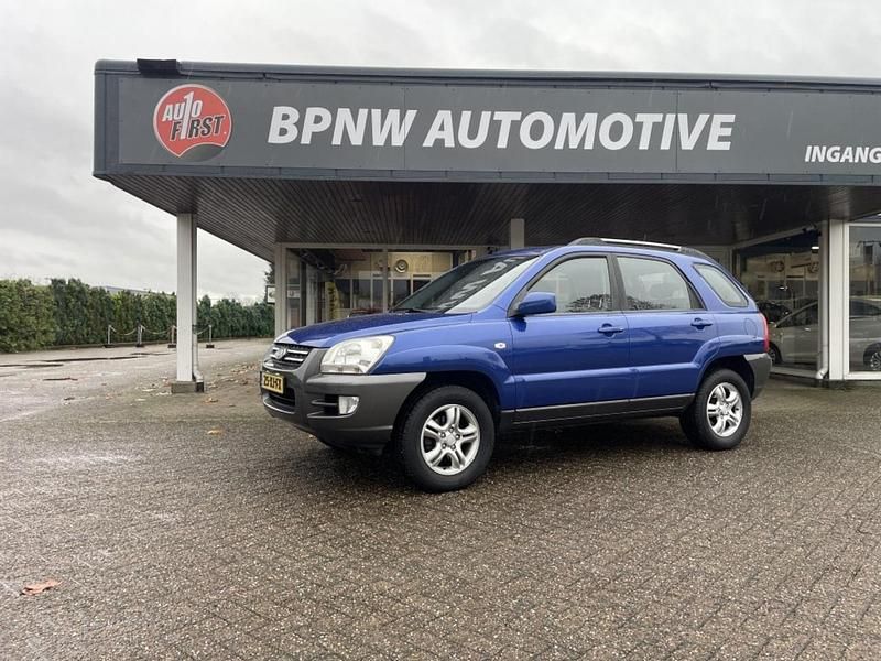 Blauw (metallic) Gebruikt 2007 Kia Sportage Comfort SUV | € 3.500 - Afbeelding 1/4