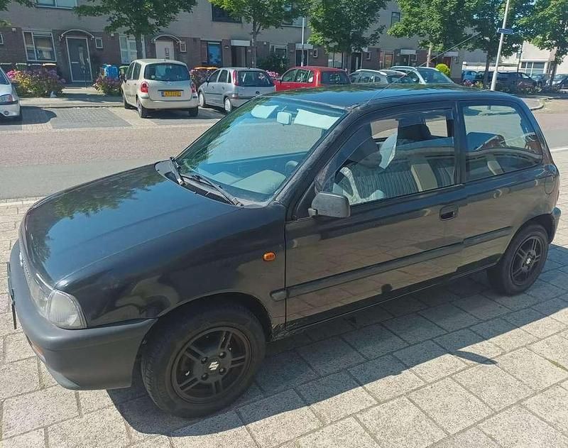 Zwart Gebruikt 2001 Suzuki Alto Hatchback | € 850 (Eerlijke prijs) - Afbeelding 1/4