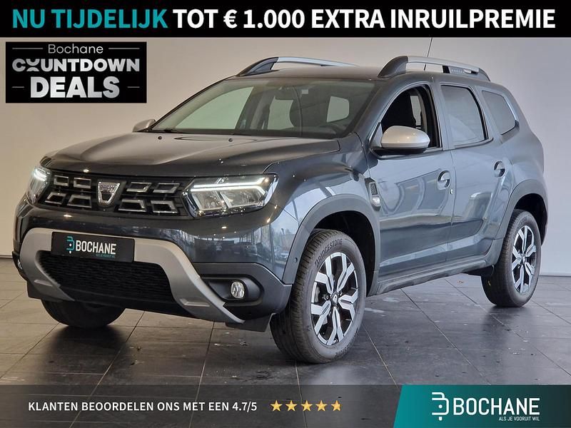 Grijs Gebruikt 2022 Dacia Duster Journey SUV | € 23.285 (Eerlijke prijs) - Afbeelding 1/4