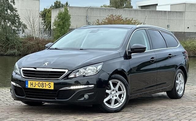 Zwart Gebruikt 2015 Peugeot 308 Stationwagen | € 4.299 (Eerlijke prijs) - Afbeelding 1/4