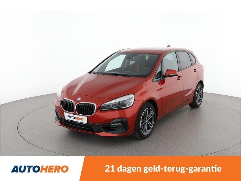 Oranje (metallic) Gebruikt 2019 BMW 218 Stationwagen | € 19.249 (Super prijs) - Afbeelding 1/4