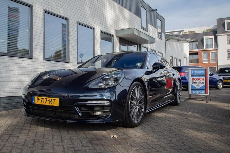 Blauw Occasion 2022 Porsche Panamera Platinum Edition Sedan | € 99.500 (Iets duurder) - Afbeelding 1/4