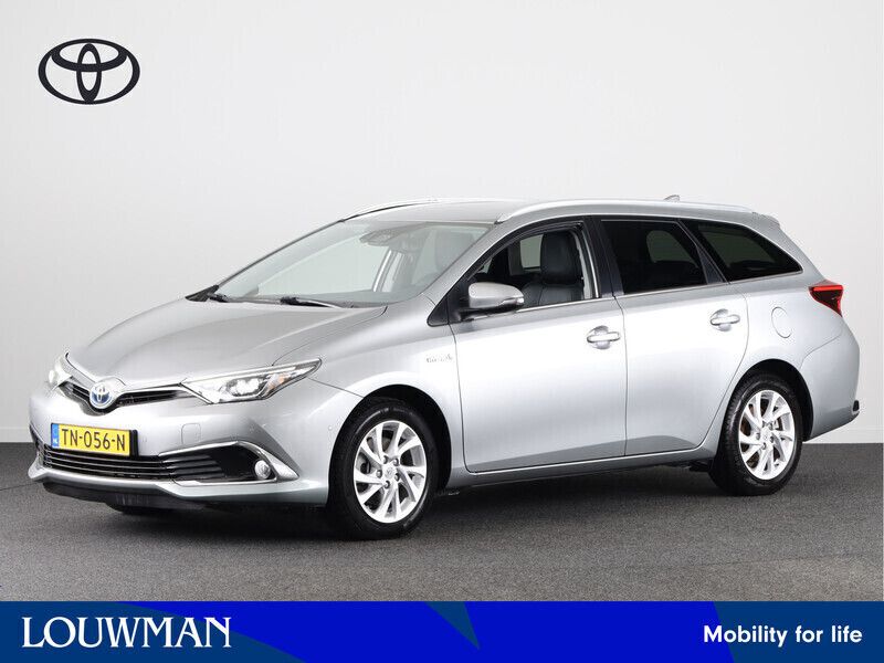Grijs Gebruikt 2018 Toyota Auris Hybrid Executive Stationwagen | € 17.745 (Eerlijke prijs) - Afbeelding 1/3