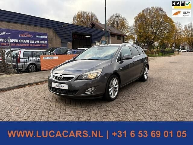 Grijs Gebruikt 2011 Opel Astra Sport Stationwagen | € 2.495 (Super prijs) - Afbeelding 1/4