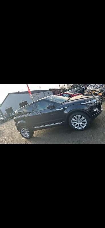 Zwart Gebruikt 2014 Land Rover Range Rover evoque Prestige SUV | € 18.750 (Eerlijke prijs) - Afbeelding 1/4