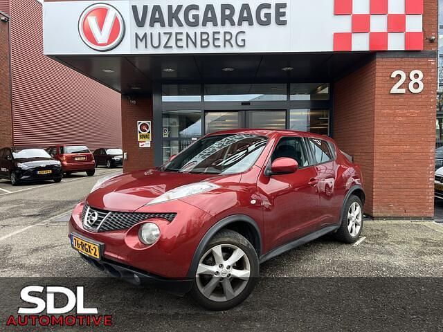 Rood (metallic) Occasion 2011 Nissan Juke Acenta SUV | € 6.445 (Eerlijke prijs) - Afbeelding 1/4