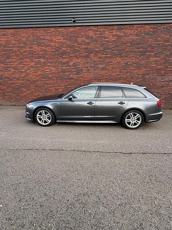 Grijs Gebruikt 2017 Audi A6 S-Line Stationwagen | € 19.250 (Eerlijke prijs) - Afbeelding 1/4