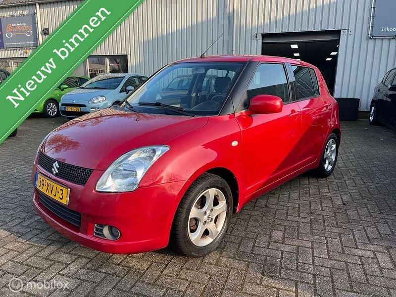 Rood Occasion 2005 Suzuki Swift Exclusive Hatchback | € 1.990 (Eerlijke prijs) - Afbeelding 1/4