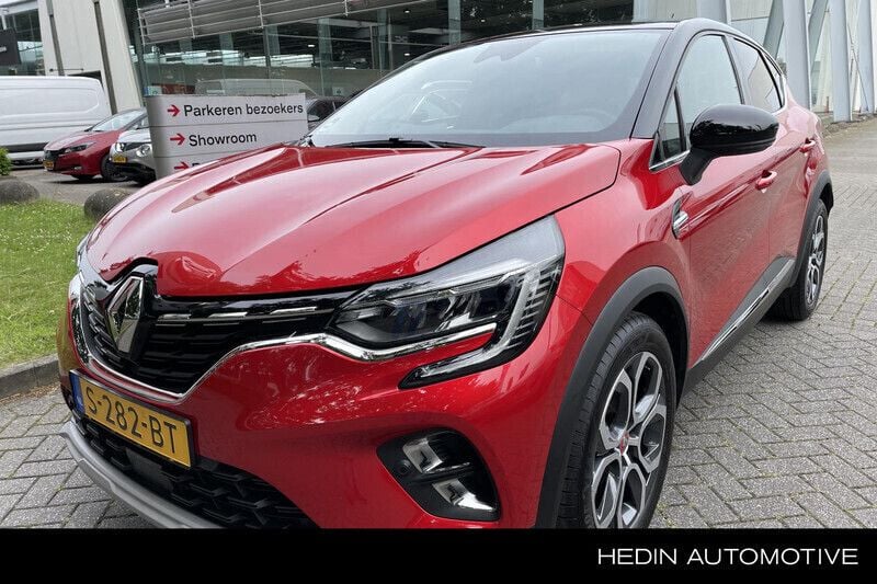 Twotone rouge flamme / noir é Gebruikt 2023 Renault Captur Techno SUV | € 20.650 (Eerlijke prijs) - Afbeelding 1/4