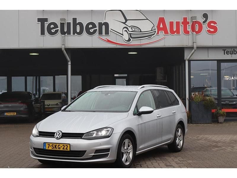 Grijs (metallic) Gebruikt 2013 VW Golf VII Comfortline Stationwagen | € 6.985 (Goede deal) - Afbeelding 1/4