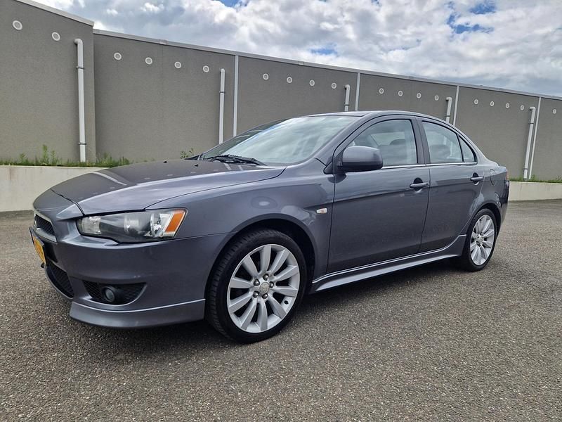 Grijs Gebruikt 2010 Mitsubishi Lancer Instyle Sedan | € 3.950 (Eerlijke prijs) - Afbeelding 1/4