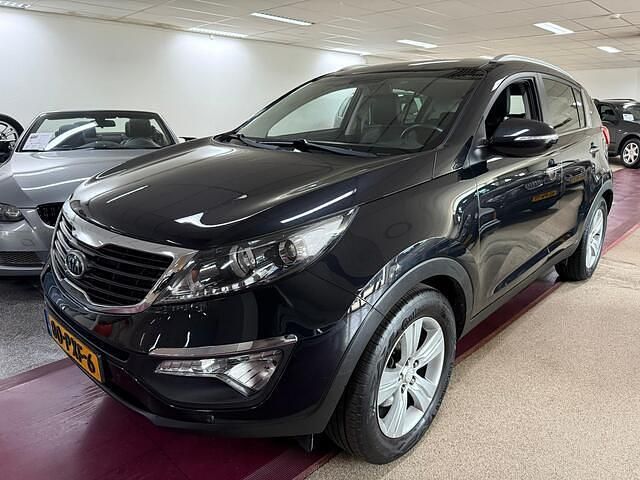 Zwart Gebruikt 2011 Kia Sportage Plus SUV | € 9.499 (Eerlijke prijs) - Afbeelding 1/4