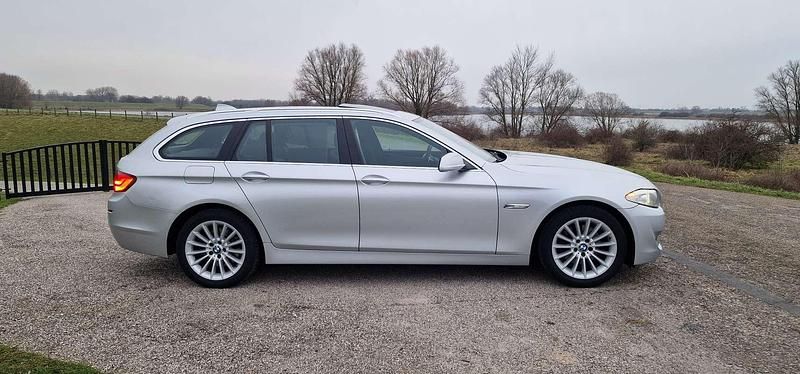 Occasion BMW 520 Executive 184 PK (135 kW) 2012 Zilver Stationwagen