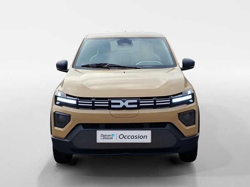 Nieuw Dacia Spring Expression 47 kW (65 PK) 2025 Beige safari hnw Hatchback