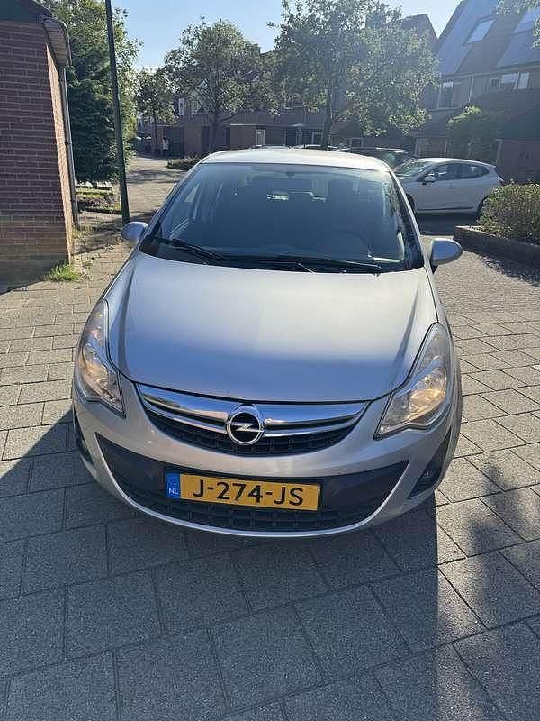 Grijs Gebruikt 2012 Opel Corsa Selection MPV | € 3.950 (Eerlijke prijs) - Afbeelding 1/4