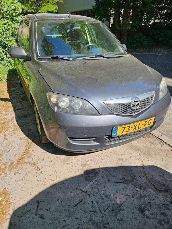 Grijs Gebruikt 2007 Mazda 2 Edition Stationwagen | € 900 (Goede deal) - Afbeelding 1/4