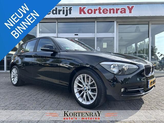 Zwart Gebruikt 2012 BMW 116 Hatchback | € 6.450 (Eerlijke prijs) - Afbeelding 1/4
