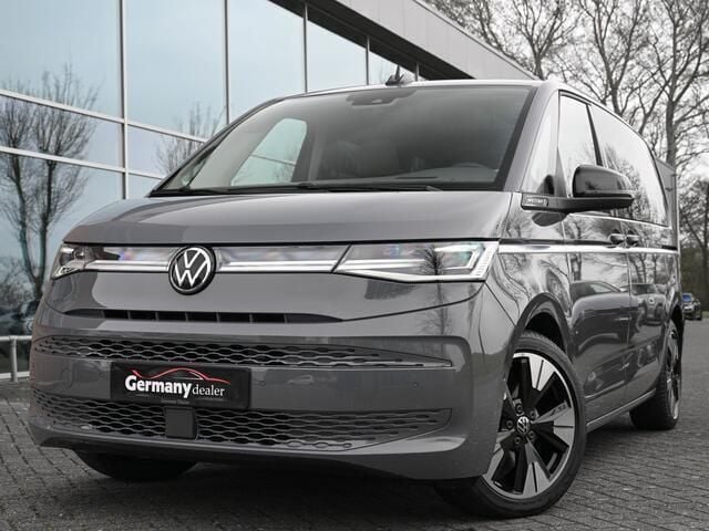Grijs Gebruikt 2023 VW Multivan Style MPV | € 59.649 (Eerlijke prijs) - Afbeelding 1/4
