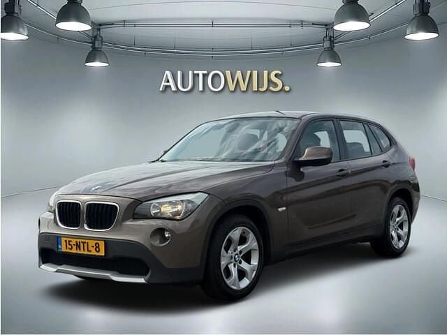 Bruin Gebruikt 2010 BMW X1 Executive SUV | € 8.890 (Eerlijke prijs) - Afbeelding 1/4