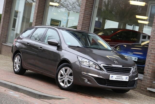 Grijs Gebruikt 2016 Peugeot 308 SW Style Stationwagen | € 6.950 (Goede deal) - Afbeelding 1/4