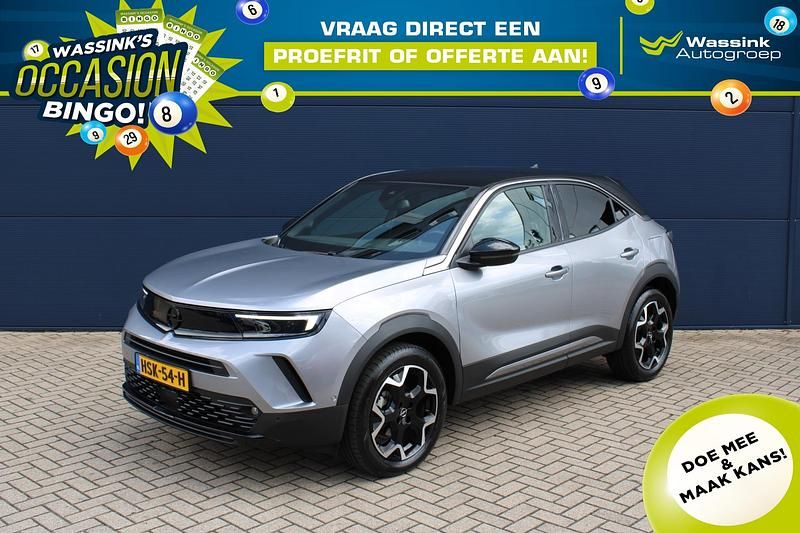 Grijs Gebruikt 2024 Opel Mokka Ultimate SUV | € 26.585 (Iets duurder) - Afbeelding 1/4