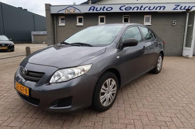 Grijs Gebruikt 2009 Toyota Corolla Terra Sedan | € 3.950 (Goede deal) - Afbeelding 1/4