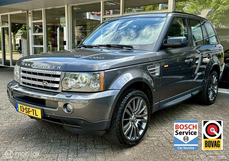 Grijs, metallic lak Occasion 2005 Land Rover Range Rover Sport SUV | € 17.950 - Afbeelding 1/4