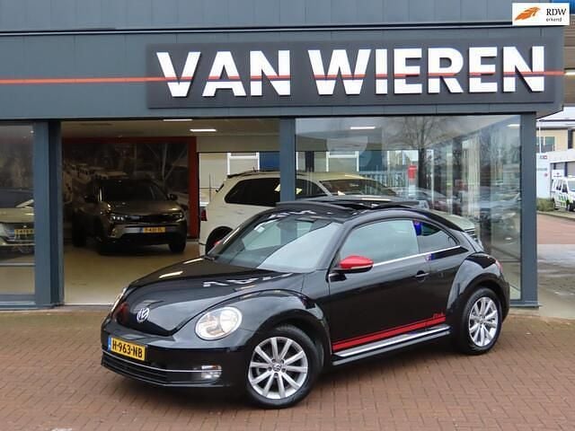 Zwart Occasion 2016 VW Beetle CLUB Hatchback | € 13.950 (Goede deal) - Afbeelding 1/4