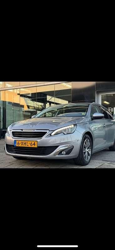 Grijs Gebruikt 2014 Peugeot 308 Stationwagen | € 7.200 - Afbeelding 1/4