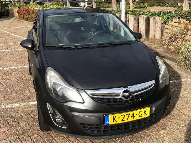 Zwart Gebruikt 2012 Opel Corsa Hatchback | € 3.800 (Goede deal) - Afbeelding 1/4