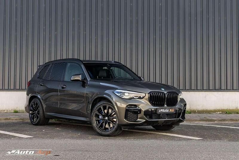 Groen, metallic lak Gebruikt 2022 BMW X5 Executive SUV | € 64.950 (Super prijs) - Afbeelding 1/4