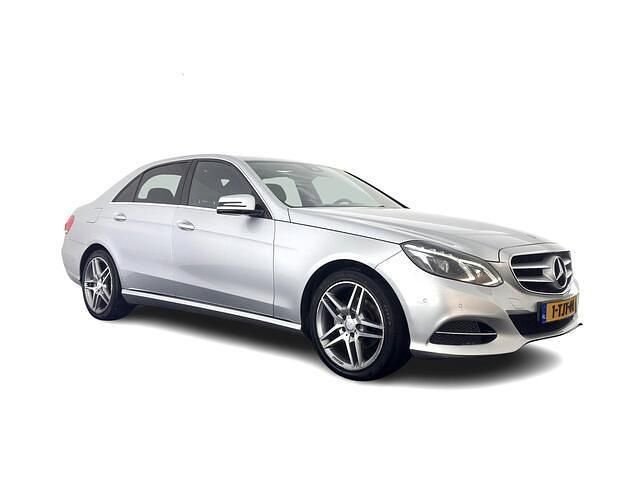 Grijs (metallic) Occasion 2014 Mercedes E200 Ambition Sedan | € 10.445 (Eerlijke prijs) - Afbeelding 1/4