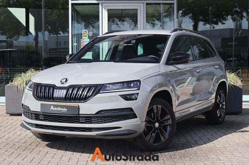 Grijs Gebruikt 2020 Skoda Karoq SportLine SUV | € 23.900 (Eerlijke prijs) - Afbeelding 1/4