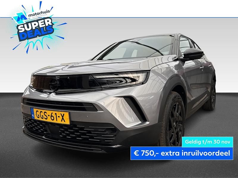 Grijs Gebruikt 2024 Opel Mokka SUV | € 27.445 (Iets duurder) - Afbeelding 1/4