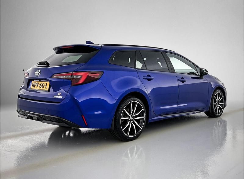 Occasion Toyota Corolla Hybrid Limited 2023 Blauw Stationwagen