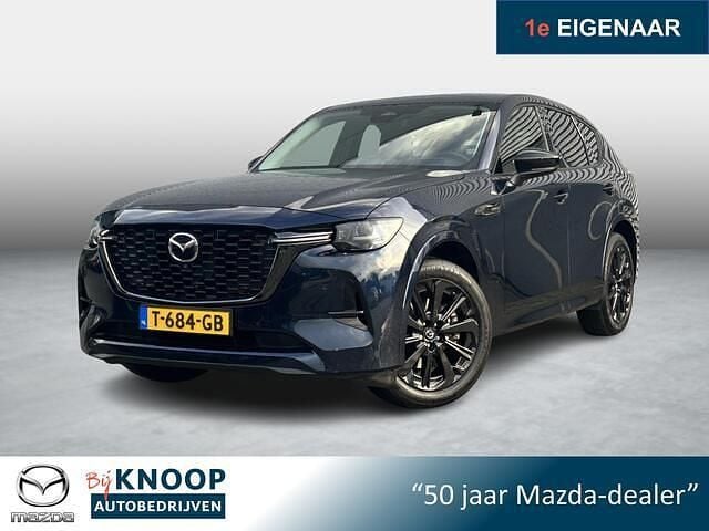 Deep crystal blue Gebruikt 2023 Mazda CX-60 Homura-Line SUV | € 38.900 - Afbeelding 1/4