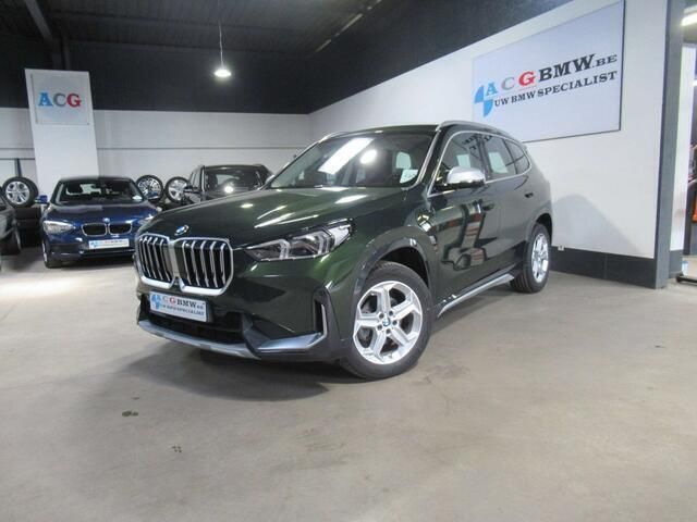Groen Gebruikt 2023 BMW X1 Luxury Line SUV | € 39.995 - Afbeelding 1/4