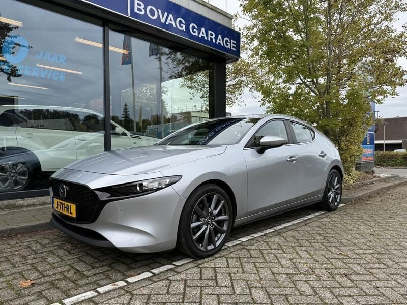 Grijs Gebruikt 2020 Mazda 3 Comfort Hatchback | € 21.750 (Eerlijke prijs) - Afbeelding 1/4