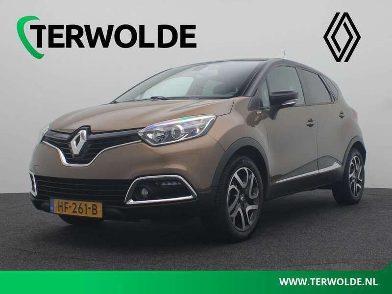 Brun cappuccino / noir etoile Gebruikt 2015 Renault Captur Signature SUV | € 10.945 (Eerlijke prijs) - Afbeelding 1/4