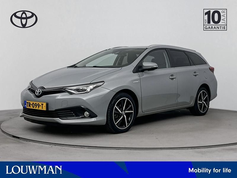 Grijs Gebruikt 2018 Toyota Auris Hybrid Stationwagen | € 17.945 (Iets duurder) - Afbeelding 1/4